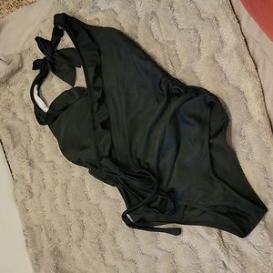 Black one piece bathing suit.